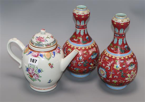 A pair of Chinese garlic neck vases and a famille rose teapot